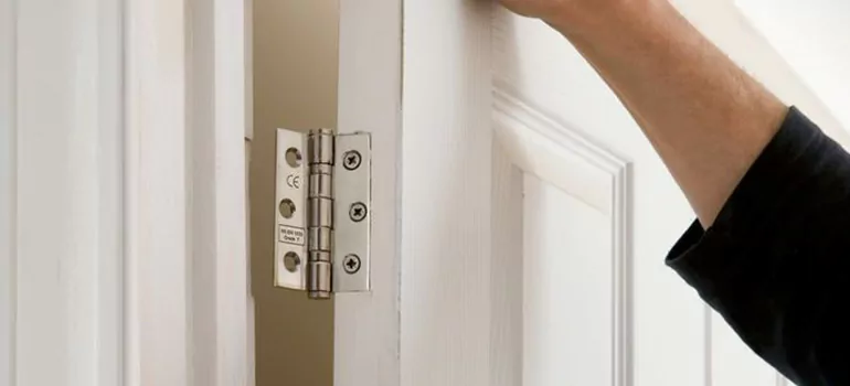 Bathroom Stall Door Hinge Repair in Winnipeg, MB